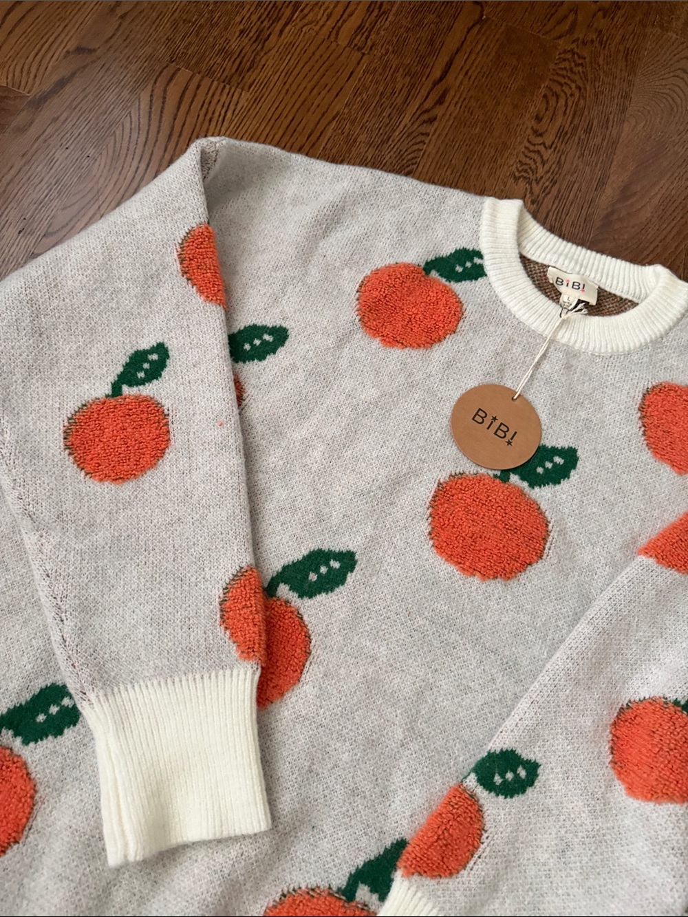 BiBi Cream Crewneck Sweater with Orange Fruit Motif large - Picture 10 of 10